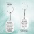 Подарочный набор из браслета и брелока с гравировкой "Доченька..." в картонной коробке